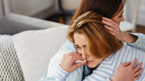 Supportive embrace showing emotional impact of wrongful death claim